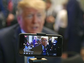 President Donald Trump sits for a radio interview in the Eisenhower Executive Office Building in the White House complex in Washington, Tuesday, Oct. 17, 2017. (AP Photo/Susan Walsh)