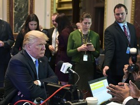 President Donald Trump sits for a radio interview in the Eisenhower Executive Office Building in the White House complex in Washington, Tuesday, Oct. 17, 2017. (AP Photo/Susan Walsh)