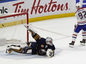 Jonathan Drouin of the Montreal Canadiens scores in the shootout against Buffalo Sabres goaltender Robin Lehner during NHL actionThursday night in Buffalo. The Habs won the season-opener for both teams, 3-2.