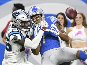 Carolina Panthers cornerback Daryl Worley (26) deflects a pass intended for Detroit Lions wide receiver Marvin Jones (11) during the first half of an NFL football game, Sunday, Oct. 8, 2017, in Detroit. (AP Photo/Jose Juarez)