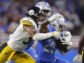 Pittsburgh Steelers inside linebacker Ryan Shazier (50) tackles Detroit Lions running back Theo Riddick (25) during the second half of an NFL football game, Sunday, Oct. 29 2017, in Detroit. (AP Photo/Paul Sancya)