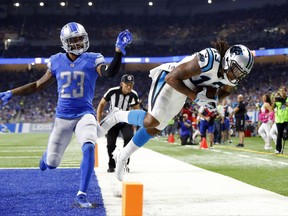 Carolina Panthers wide receiver Kelvin Benjamin (13) beats Detroit Lions cornerback Darius Slay (23) for a 31-yard reception for a touchdown during the second half of an NFL football game, Sunday, Oct. 8, 2017, in Detroit. (AP Photo/Paul Sancya)
