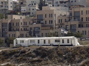 A general view of Nof Zion residential area is seen Wednesday, Oct.25, 2017, in east Jerusalem. The Jerusalem municipality says that city officials have approved construction of 176 new homes in Nof Zion and that the new homes will more than double the size of the current settlement, making it the largest Jewish settlement in the heart of an Arab area of east Jerusalem. (AP Photo/Mahmoud Illean)
