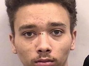This Oct. 17, 2017 photo provided by the Colorado Springs, Colo., Police Department shows Malik Vincent Murphy, who was arrested on suspicion of fatally stabbing his younger brother and sister and also attacking his father in their Colorado home. (Colorado Springs Police Department via AP)