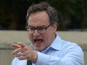 Ezra Levant speaks to a crowd in downtown Calgary, Alta. on Thursday July 31, 2014.