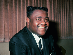 Pianist and singer Fats Domino mixed popular jazz with R&B and rock'n'roll influences.