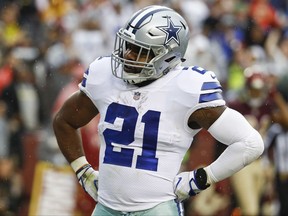 Dallas Cowboys running back Ezekiel Elliott (21) celebrates his touchdown during the first half of an NFL football game against the Washington Redskinsin Landover, Md., Sunday, Oct. 29, 2017. (AP Photo/Patrick Semansky)