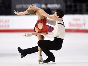 Kaitlyn Weaver and Andrew Poje perform their free dance during the Canadian figure skating championships in Ottawa on Saturday, Jan. 21, 2017.