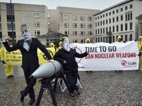 Activists of the International Campaign to Abolish Nuclear Weapons (ICAN) protest against the conflict between North Korea and US.