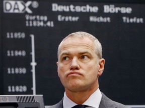 FILE - In this March 1, 2017 file photo CEO of the German equity trading firm Deutsche Boerse AG Carsten Kengeter attends the company's launch of the Scale segment at the stock market in Frankfurt, Germany. Deutsche Boerse said Thursday, Oct. 26, 2017 that the supervisory board accepted Kengeter's offer to step down as CEO.   (AP Photo/Michael Probst)