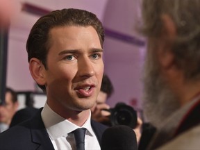 Foreign Minister Sebastian Kurz, head of Austrian People's Party, gives an interview in Vienna, Austria, Sunday, Oct. 15, 2017, after the closing of the polling stations for the Austrian national elections. (AP Photo/Kerstin Joensson)