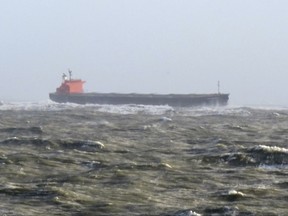 The photo provided by Germany's Central command for maritime emergencies shows the Panama-flagged bulk carrier Glory Amsterdam which ran aground off the shore of the German island of Langeoog on Sunday, Oct. 29, 2017. Germany was hit by a heavy storm on Sunday. (Central command for maritime emergencies via AP)