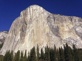 FILE - This Jan. 14, 2015 file photo shows El Capitan in Yosemite National Park, Calif. Brad Gobright and climbing partner Jim Reynolds set a new speed record for ascending the Nose route of El Capitan in Yosemite National Park on Saturday, Oct. 21, 2017. The two climbers raced up the nearly 90-degree, 2,900-foot precipice in 2 hours and 19 minutes. (AP Photo/Ben Margot, File)