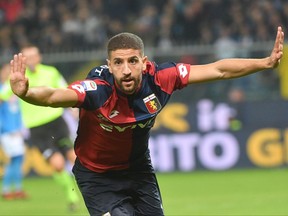 Genoa's Adel Taarabt celebrates after scoring his side's first goal during the Italian Serie A soccer match between Genoa and Napoli at the Luigi Ferraris stadium in Genoa, Italy, Wednesday, Oct. 25, 2017. (Luca Zennaro/ANSA via AP)