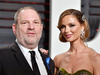 Harvey Weinstein and his wife Georgina Chapman at the 2017 Vanity Fair Oscar Party. Chapman released a statement saying she will leave Weinstein in light of the sexual harassment allegations.