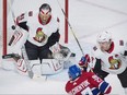 Montreal Canadiens forward Alex Galchenyuk scores on Ottawa Senators goaltender Craig Anderson as defenceman Dion Phaneuf watches on Sept. 30.