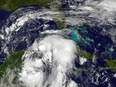 Nate gained strength Friday as it headed toward popular Mexican beach resorts and ultimately the US Gulf coast after dumping heavy rains in Central America that left at least 22 people dead