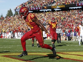 Iowa State wide receiver Hakeem Butler (18) celebrates after catching a 4-yard touchdown pass during the first half of an NCAA college football game against TCU, Saturday, Oct. 28, 2017, in Ames, Iowa. (AP Photo/Charlie Neibergall)
