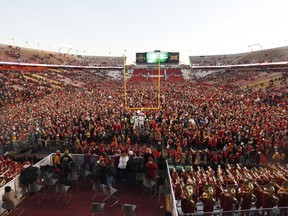 Fans celebrate on the field after Iowa State defeated TCU 14-7 in an NCAA college football game, Saturday, Oct. 28, 2017, in Ames, Iowa. (AP Photo/Charlie Neibergall)