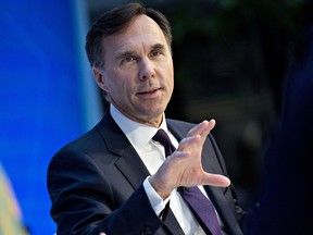 Bill Morneau, Canada's finance minister, speaks during a debate at the International Monetary Fund (IMF) and World Bank Group Annual Meetings in Washington, D.C., U.S., on Thursday, Oct. 12, 2017.