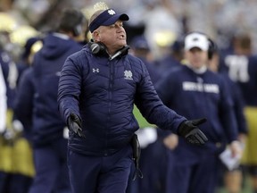 Notre Dame head coach Brian Kelly argues a call during the first half of an NCAA college football game against North Carolina State, Saturday, Oct. 28, 2017, in South Bend, Ind. (AP Photo/Darron Cummings)