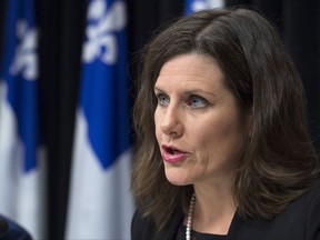 Quebec Justice Minister Stephanie provides further details about how the government's controversial Bill 62 will be implemented at the legislature in Quebec City Tuesday, October 24, 2017. The law bans people from giving or receiving public services if their face is covered. THE CANADIAN PRESS/Jacques Boissinot