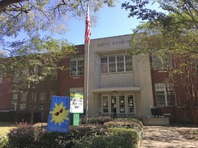 Davis International Baccalaureate Elementary School in Jackson, Miss., photographed Wednesday, Oct. 18, 2017, is shedding the name of Jefferson Davis, the Confederacy's only president and will instead be named for Barack Obama, the first African-American president of the United States. In a move proposed by parents, the school with 98 percent African-American enrollment is slated to be renamed for Obama, starting next academic year. The PTA president announced the planned change at a school board meeting Tuesday. (AP Photo/Emily Wagster Pettus)