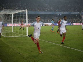 England's Philip Foden celebrates after scoring a goal during the FIFA U-17 World Cup final match between England and Spain in Kolkata, India, Saturday, Oct. 28, 2017. (AP Photo/Anupam Nath)