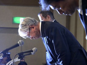 Kobe Steel President and CEO Hiroya Kawasaki  bows during a press conference in Tokyo, Friday, Oct. 13, 2017. Steel maker Kobe Steel apologized Thursday after finding wider problems, dating back to 2011, with faked inspections data for metals used in many products, including cars, bullet trains, aircraft and appliances. (AP Photo/Koji Sasahara)