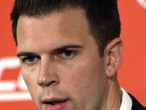 Louisville acting head coach David Padgett answers a reporter's question during an NCAA college football media day, Sunday, Oct. 29, 2017, in Louisville, Ky. (AP Photo/Timothy D. Easley)