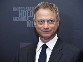 FILE - In this March 16, 2015 file photo Gary Sinise arrives at the Los Angeles Dinner : What You Do Matters at the Beverly Hilton Hotel in Beverly Hills, Calif. Sinise has been named grand marshal of the 2018 Rose Parade, which will feature the theme "Making a Difference." (Photo by Chris Pizzello/Invision/AP, File)