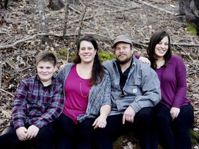 In this undated photo provided by Irma Muniz shows the Shepherd family, Jon and Sara Shepherd and their children, Kressa, and Kai. Kai, left, was killed after a wildfire tore through his family's home in Redwood Valley, Calif. on Monday, Oct. 9, 2017. He was 14 when he died, said his aunt, Mindi Ramos. Sara and 17-year-old daughter, Kressa, both sustained burns on 60% of their bodies. Jon sustained burns on 45% of his body. Relatives are trying to raise money to cover medical expenses and prepare to eventually bring the family to live with Sara's parents' home in Redwood Valley. (Irma Muniz via AP)