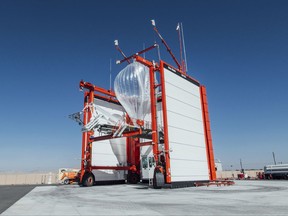 This Wednesday, Oct. 18, 2017 photo provided by Project Loon shows a stratospheric balloon being prepared for launch from the project site in Winnemucca, Nev. Google's parent Alphabet Inc. said Friday that its stratospheric balloons are now delivering the internet to remote areas of Puerto Rico where cellphone towers were knocked out by Hurricane Maria. Two of the search giant's "Project Loon" balloons are already over the country enabling texts, emails and basic web access to AT&T customers with handsets that use its 4G LTE network.  (Project Loon via AP)