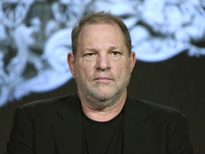 FILE - In this Jan. 6, 2016 file photo, producer Harvey Weinstein participates in the "War and Peace" panel at the A&E 2016 Winter TCA in Pasadena, Calif. Weinstein has been fired from The Weinstein Co., effective immediately, following new information revealed regarding his conduct, the company's board of directors announced Sunday, Oct. 8, 2017. (Photo by Richard Shotwell/Invision/AP, File)