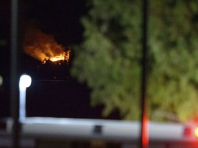 Jefferson Parish authorities and others from other parishes respond to an oil rig explosion in Lake Pontchartrain as seen from a staging area near the Treasure Chest Casino in Kenner, La., Sunday, Oct. 15, 2017. (Matthew Hinton/The Advocate via AP)