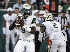 South Florida quarterback Quinton Flowers (9) looks to throw against Tulane during the first half of an NCAA college football game in New Orleans, La., Saturday, Oct. 21, 2017. (AP Photo/Derick E. Hingle)