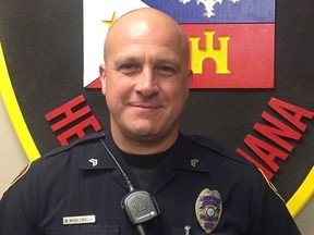 This photo provided by the Lafayette Police Department shows Cpl. Michael Paul Middlebrook, a nine-year patrol veteran who was shot and killed in the line of duty late Sunday, Oct. 1, 2017. Louisiana State Police say he was killed late Sunday after responding to a call about a shooting at a Big Boy convenience store.  (Lafayette Police Department via AP)