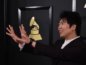 Pianist Lang Lang, nursing an injured arm, has found an innovative solution to avoid missing Carnegie Hall's annual gala on Oct. 4: A young protege will literally lend a hand.