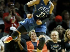 Minnesota Lynx forward Maya Moore reacts after she makes a shot and gets a foul called on the Los Angeles Sparks during the second half in Game 4 of the WNBA basketball finals, Sunday, Oct. 1, 2017, in Los Angeles. The Lynx won 80-69. (AP Photo/Alex Gallardo)