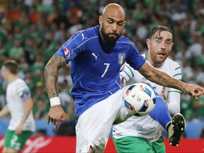 FILE - In this Wednesday, June 22, 2016 file photo, Italy's Simone Zaza goes for the ball during the Euro 2016 Group E soccer match between Italy and Ireland at the Pierre Mauroy stadium in Villeneuve d'Ascq, near Lille, France. Valencia chose to acquire the Italian striker after his loan from Juventus expired last season and he has been crucial in the team's surprising run to the top of the Spanish league. (AP Photo/Antonio Calanni, File)