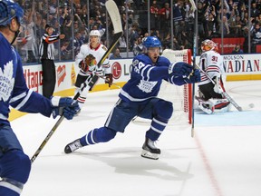 Auston Matthews of the Toronto Maple Leafs celebrates his game-winning goal in overtime against the Chicago Blackhawks during NHL action Monday night at the Air Canada Centre. The Leafs improved to 3-0  by virtue of their 4-3 win.