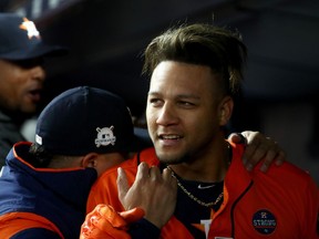 Houston Astros first baseman Yuli Gurriel celebrates his three-run double against the New York Yankees on Oct. 17.