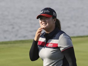 Angel Yin of the United States smiles after finishing the second round of the LPGA KEB HanaBank Championship at Sky72 Golf Club in Incheon, South Korea, Friday, Oct. 13, 2017. (AP Photo/Lee Jin-man)