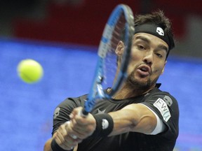 FILE - In this Sunday, Sept. 24, 2017 file photo, Fabio Fognini of Italy returns the ball to Damir Dzumhur of Bosnia and Herzegovina during the St. Petersburg Open ATP tennis tournament final match in St.Petersburg, Russia. There won't be any more tolerance for Fabio Fognini after the Italian vulgarly insulted the chair umpire at the U.S. Open. The Grand Slam board announced Wednesday, Oct. 11 that Fognini will be suspended from participating in two major tournaments _ one of which will be the U.S. Open - if he commits another major offense before the end of 2019. (AP Photo/Dmitri Lovetsky, file)