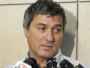 In this Friday, July 30, 2010 file photo, Dr. Paolo Macchiarini talks to journalists during a press conference, in Florence, Italy. Swedish prosecutors told a news conference Thursday Oct. 12, 2017, the investigation against a disgraced stem cell scientist suspected of involuntary manslaughter in connection with three patients who died after windpipe transplants, has been abandoned, meaning the Italian doctor, Dr. Paolo Macchiarini is no longer considered a suspect.