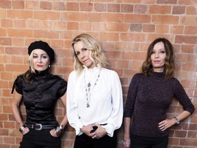 In this Friday, Oct. 6, 2017 photo, members of 'Bananarama' from left, Siobhan Fahey, Sara Dallin, and Keren Woodward, pose for a portrait in London to promote their new tour. Bananarama is back together after thirty years  and it is touring the U.S. for the first time. The girl group's original members _ Sarah Dallin, Keren Woodward and Siobhan Fahey  say they began rehearsals this week for the shows, due to start in February. (Photo by Grant Pollard/Invision/AP)