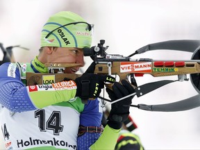 FILE - This is a Sunday Feb, 5, 2012  file photo of Slovenia's  Teja Gregorin, as she  aims her rifle to finish third in the women's 12.5 km WC biathlon mass start race in Holmenkollen in Oslo . Gergorin was the only athlete who failed doping retests from the 2010 Vancouver Olympics. The International Biathlon Union said Thursday Oct. 26, 2017, that two samples given by Teja Gregorin tested positive for the banned substance GHRP-2.( Hakon Mosvold Larsen/NTB scanpix, File via AP)