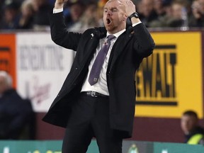 Burnley manager Sean Dyche reacts to play during the English Premier League soccer match Burnley versus Newcastle at Turf Moor, Burnley, England, Monday Oct. 30, 2017. (Martin Rickett/PA via AP)