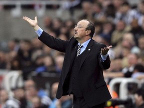 Newcastle United manager Rafael Benitez reacts during the Premier League soccer match at against Liverpool at St James' Park, Newcastle, England, Sunday Oct. 1, 2017. (Owen Humphreys/PA via AP)