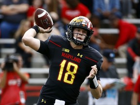 Maryland quarterback Max Bortenschlager throws to a receiver in the first half of an NCAA college football game against Northwestern in College Park, Md., Saturday, Oct. 14, 2017. (AP Photo/Patrick Semansky)